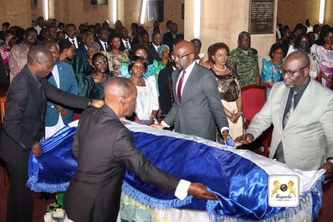 Prayers for the late Owek. Nelson Kawalya at Namirembe cathedral as the casket is surrounded by mourners